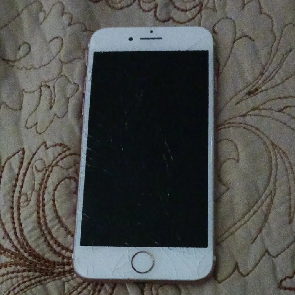 Apple iPhone with White and Rose Gold Accents